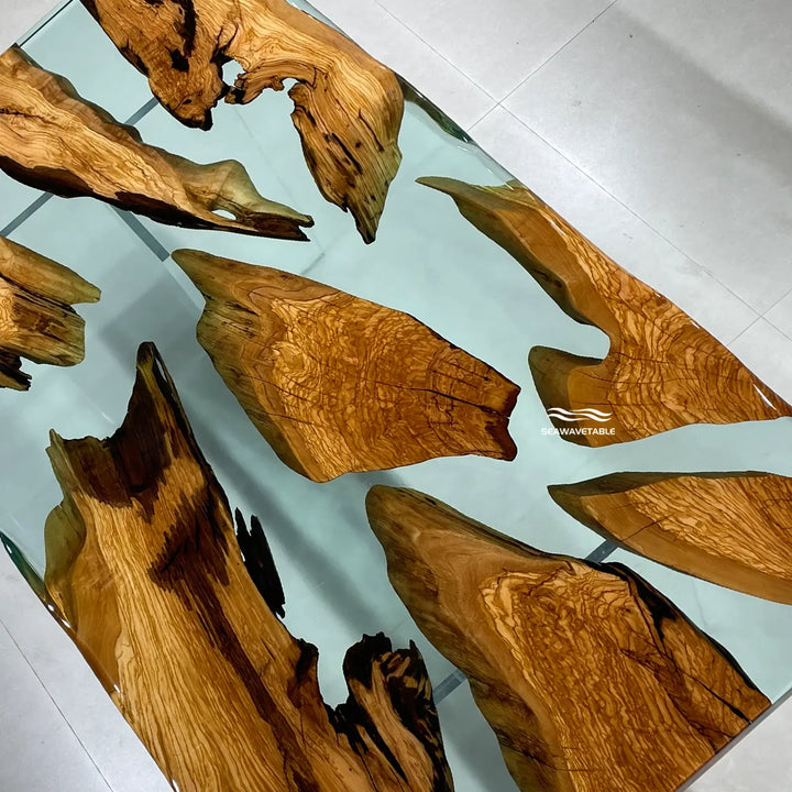 Epoxy Resin Olive Wood Dining Table detail showcasing polished resin clarity, warm wood tones, and premium handcrafted details of a modern dining table wood and epoxy table - SeaWaveTable
