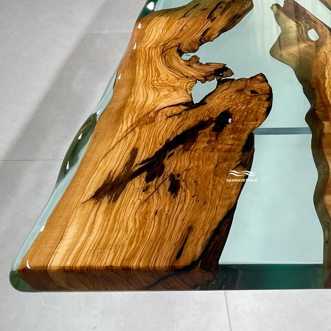 Epoxy Resin Olive Wood Dining Table detail featuring organic olive wood textures, live edge characteristics, and refined epoxy table surface design for a luxury dining table wood style - SeaWaveTable