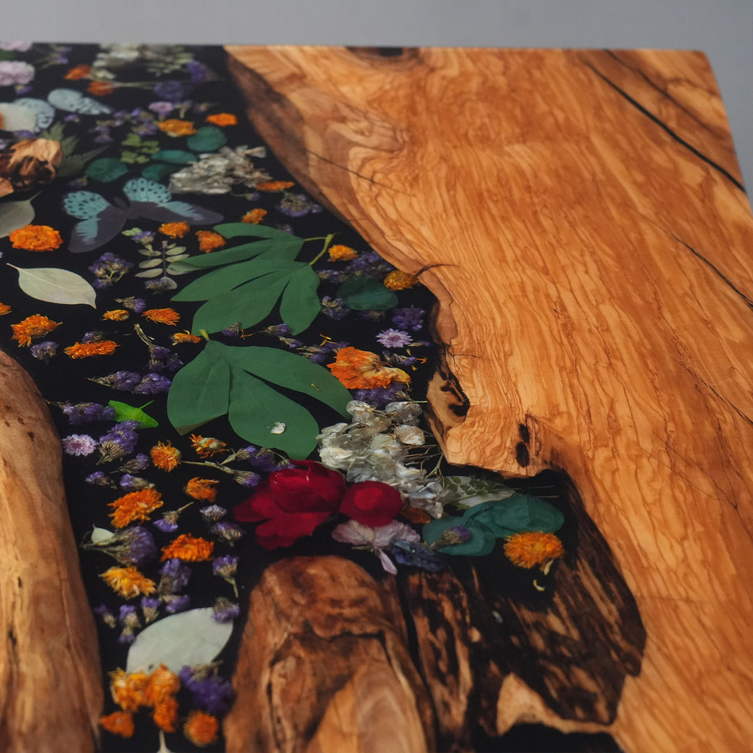 Premium olive wood dining table with glossy resin finish