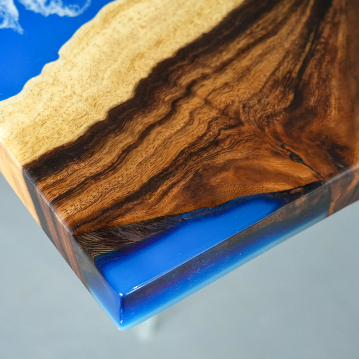 Custom epoxy resin river dining table with natural hardwood finish