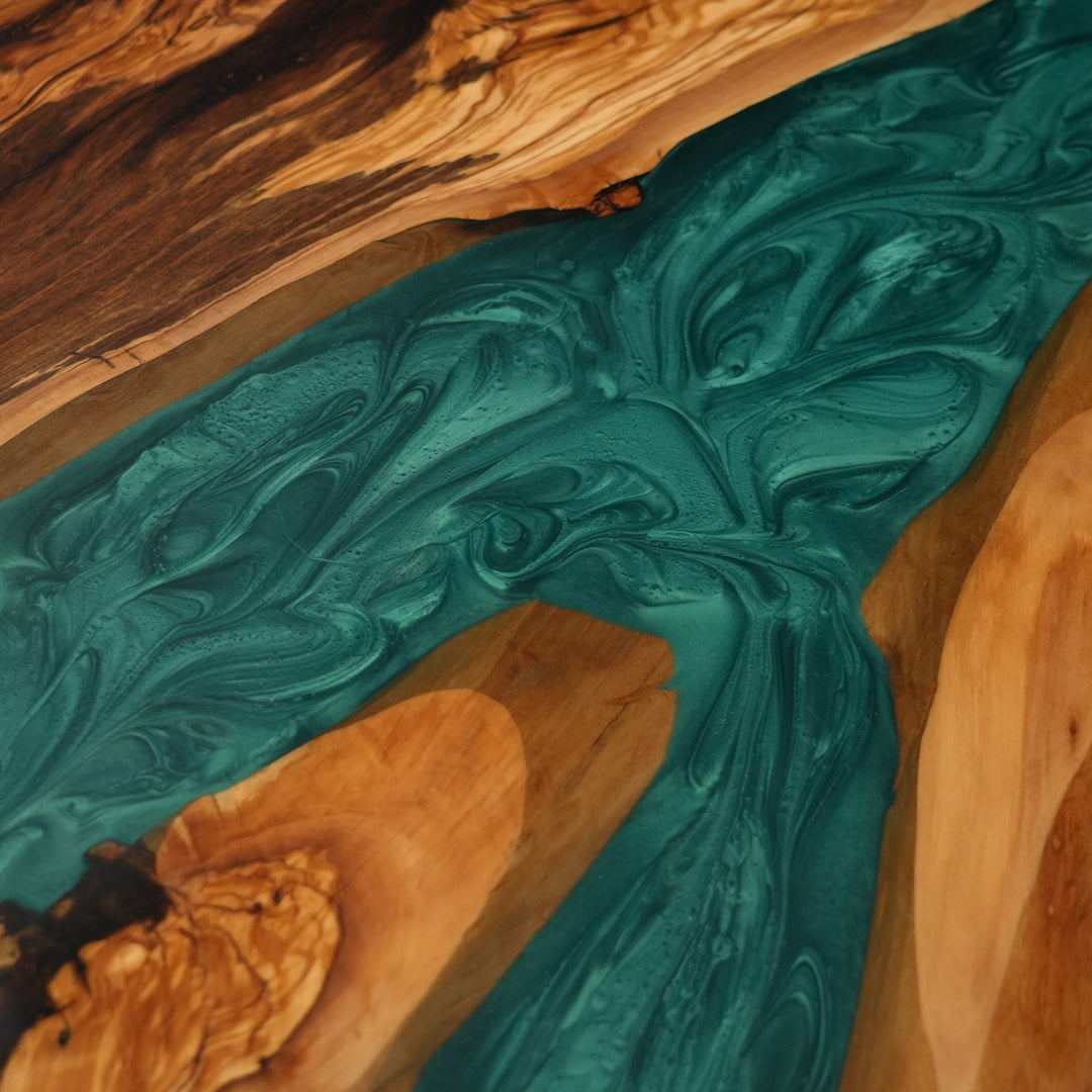Modern coastal dining table with green resin river