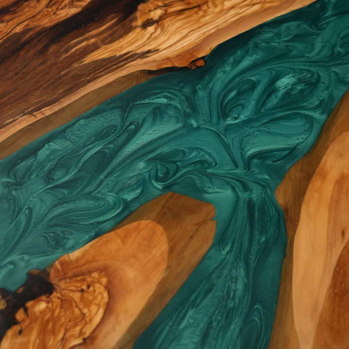 Modern coastal dining table with green resin river