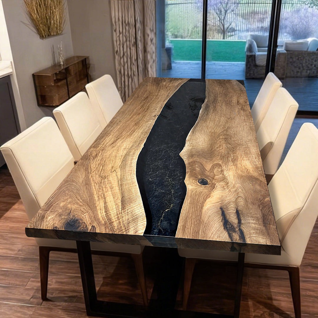 Custom epoxy resin dining table with clear river finish and free metal legs