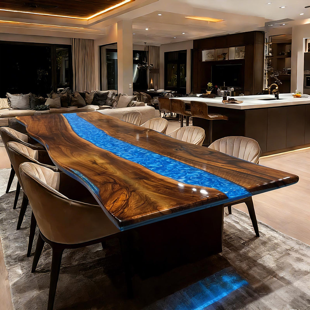 Dining room with a large wooden table featuring a blue resin inlay