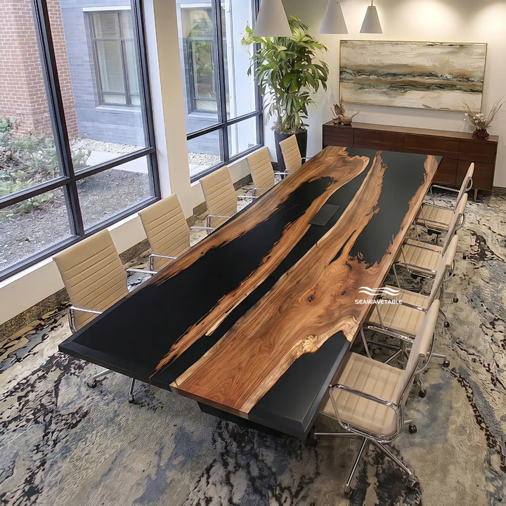 Modern office meeting room featuring a black walnut conference table with epoxy top, surrounded by chairs in a professional workspace - SeaWaveTable