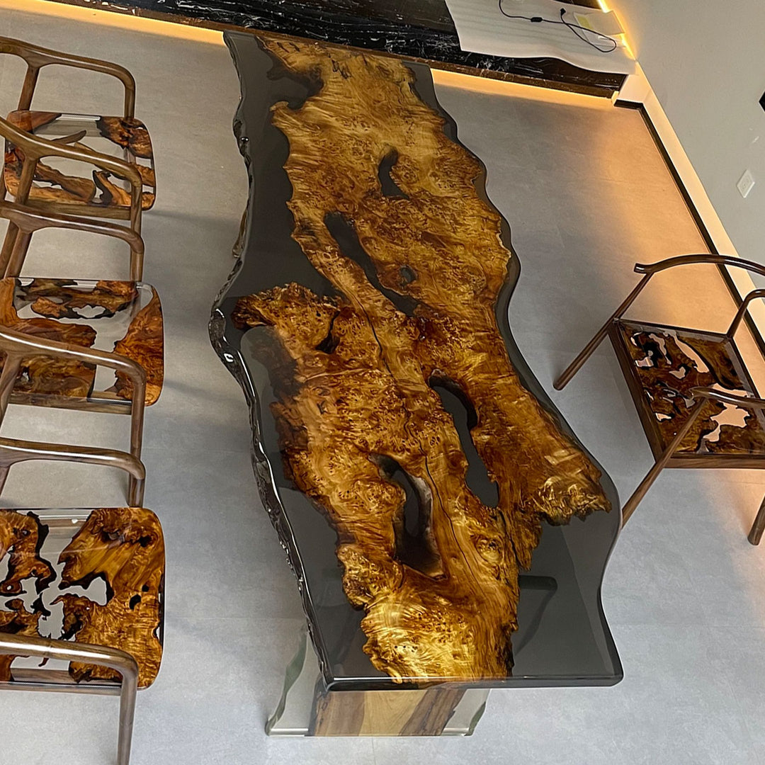 Striking live - edge resin table featuring poplar wood with dramatic grain patterns