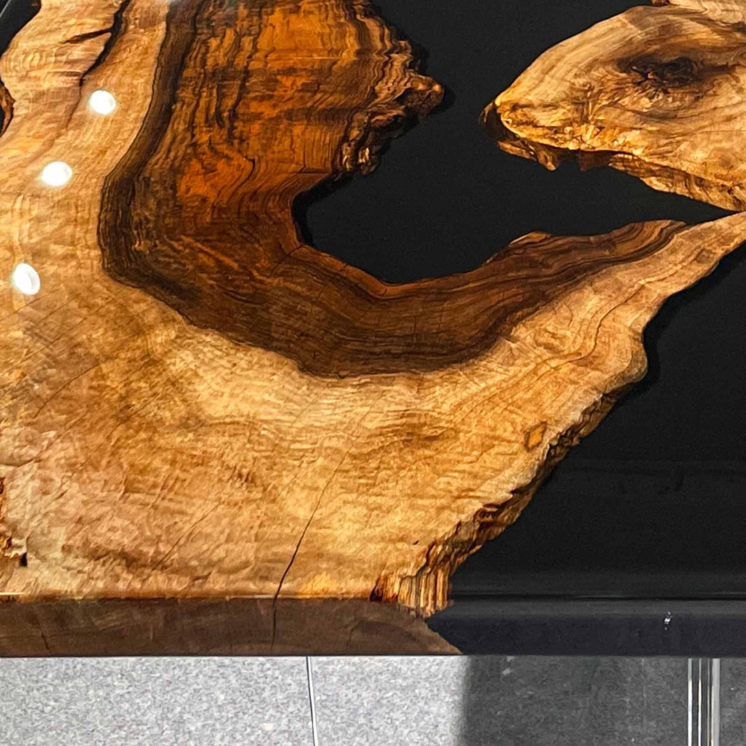 Close-up of premium walnut burl grain in CRT-259 epoxy resin table