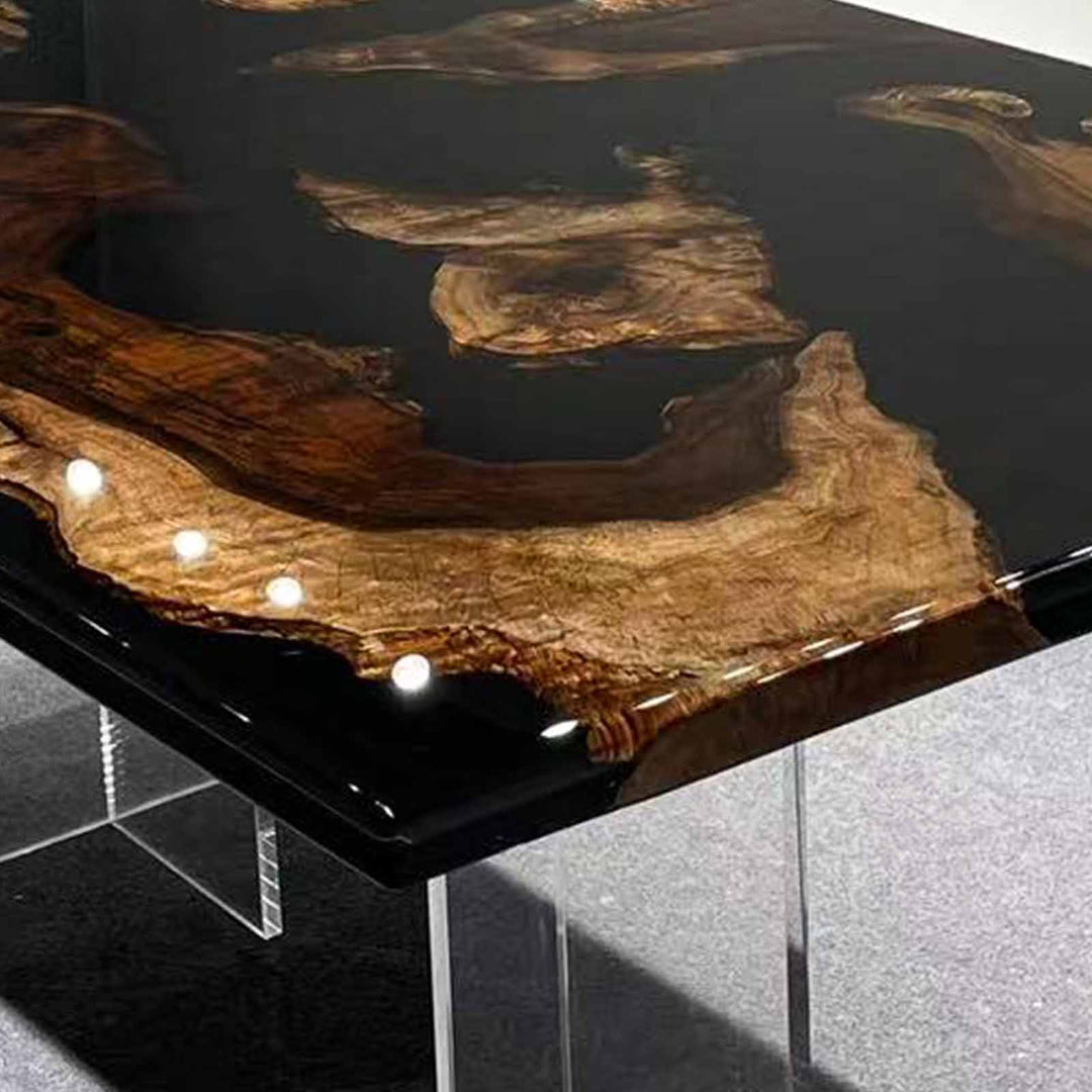 Hand-poured midnight black resin finish on a solid black walnut coffee table