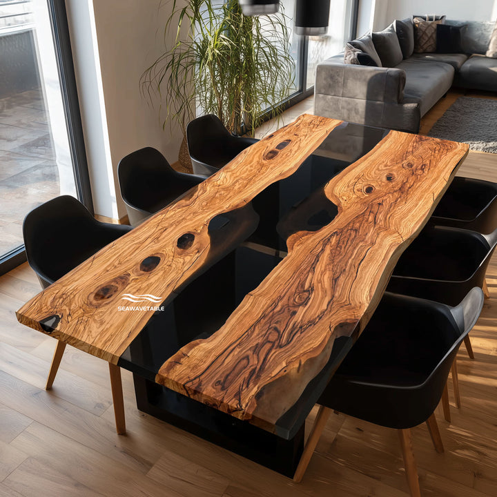 Modern lodge style dining table featuring wild honey-toned wood grain and black epoxy.