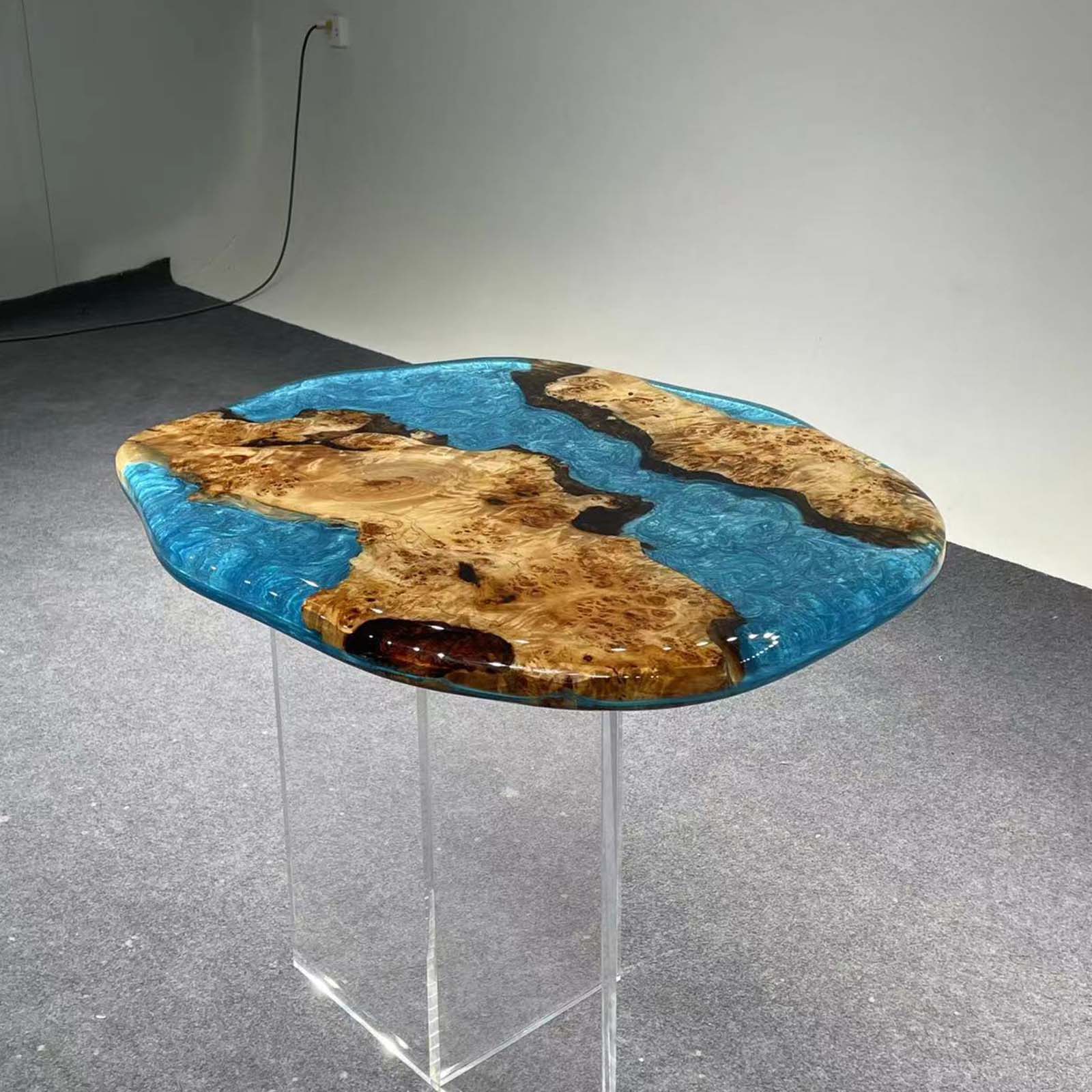 Close-up of shimmering resin capturing wave-like sunlight reflections