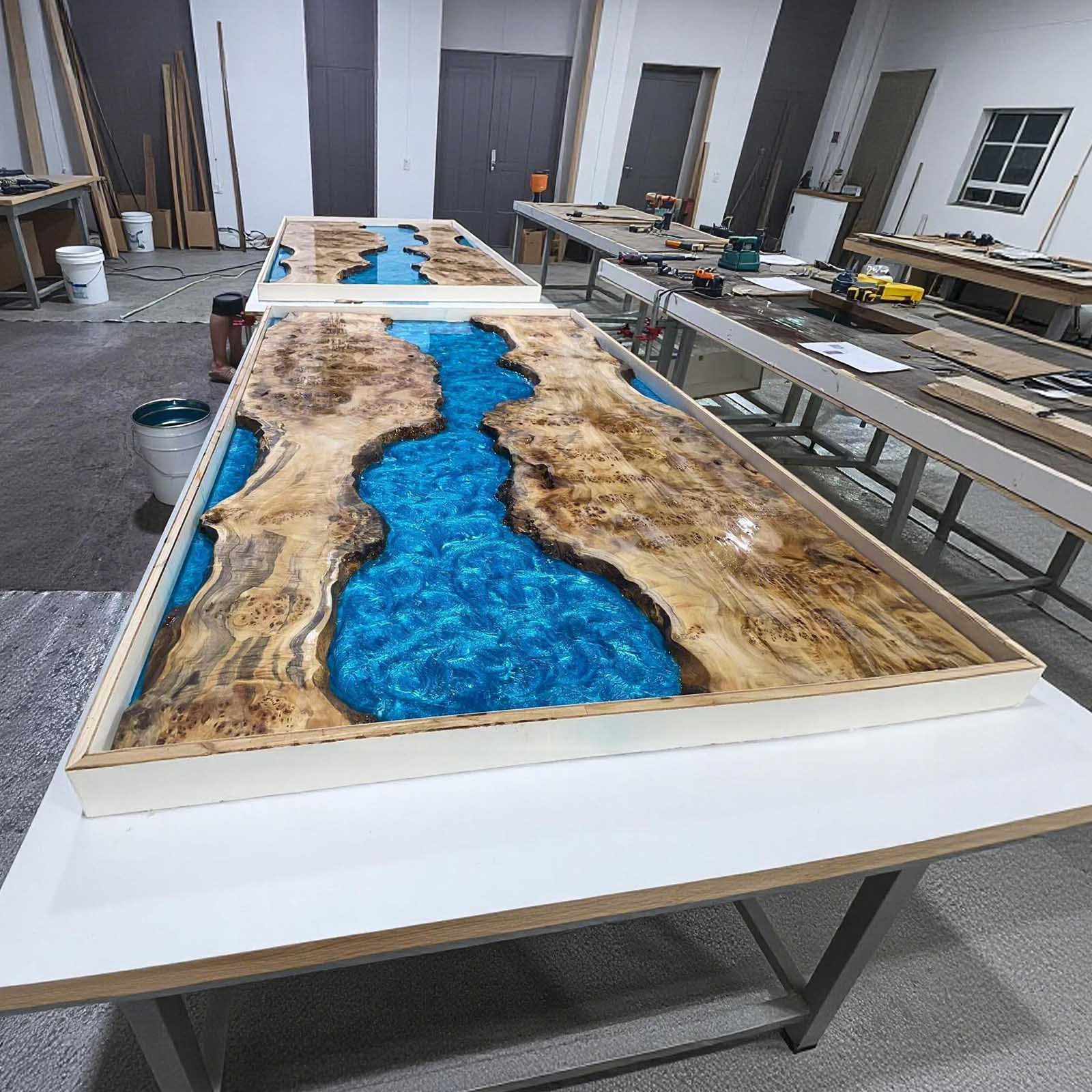 Live edge detail of custom blue resin poplar dining table