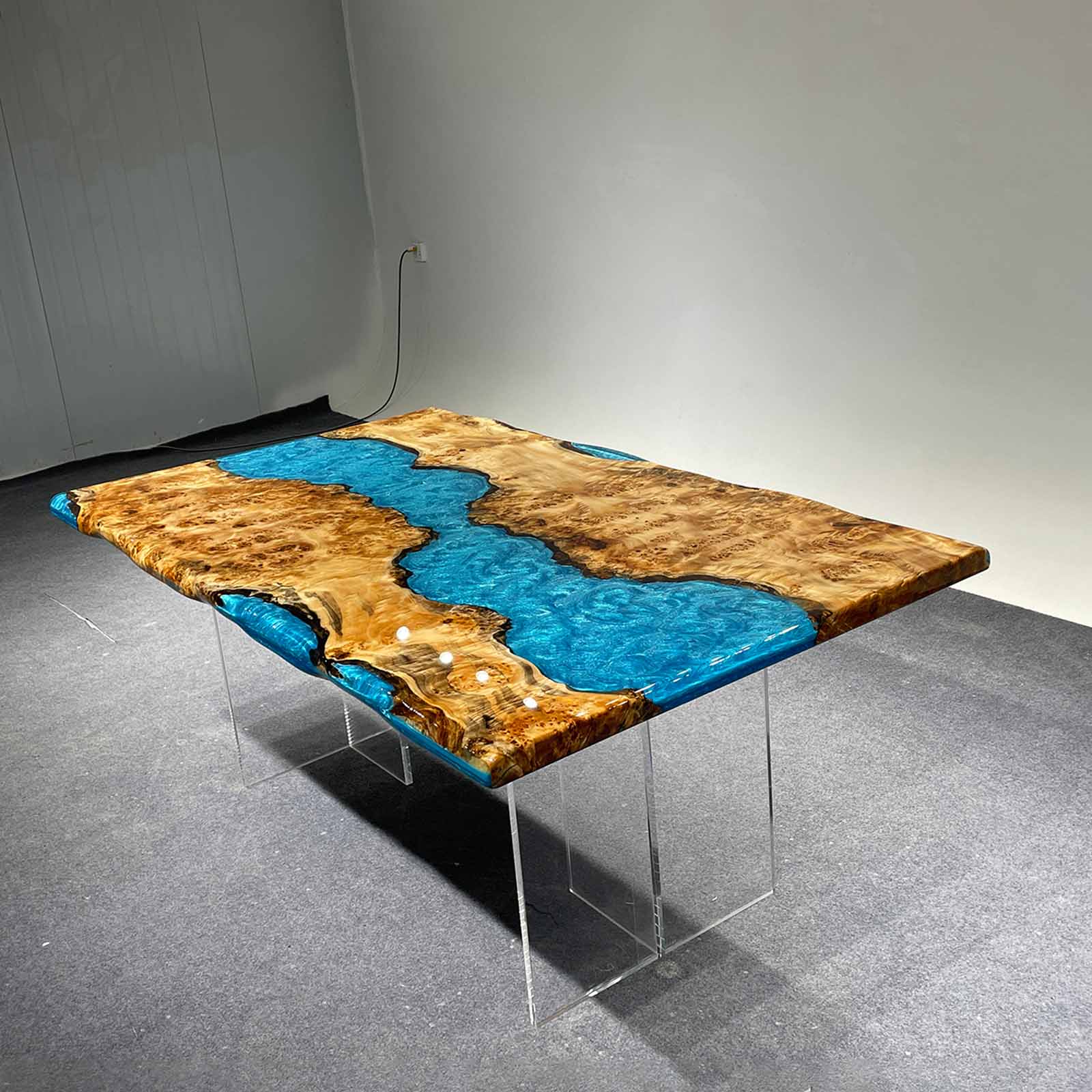 Full room view of poplar dining table and poolside pavilion