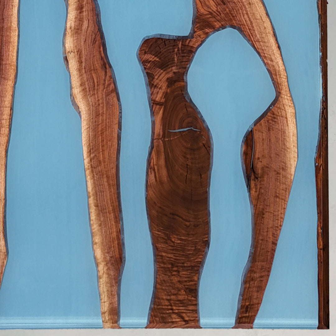 Modern coastal black walnut epoxy table with sky blue resin