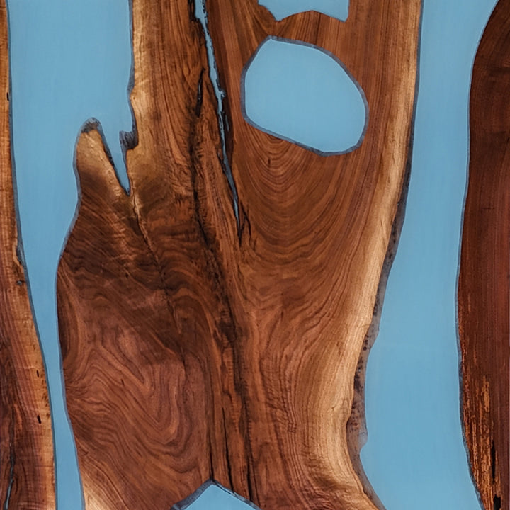 Artistic epoxy river table with black walnut wood and ocean tones