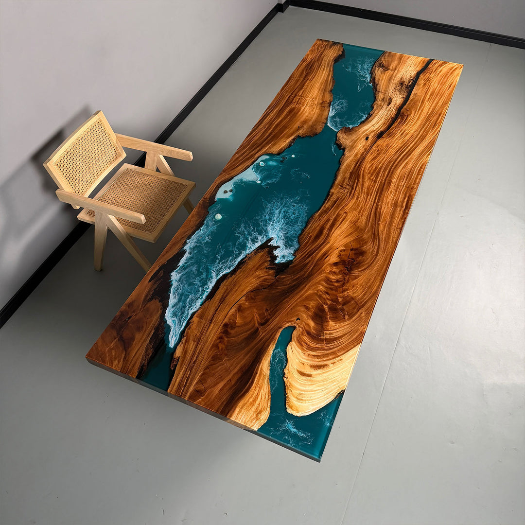 Live edge wood epoxy river table with teal ocean wave resin design