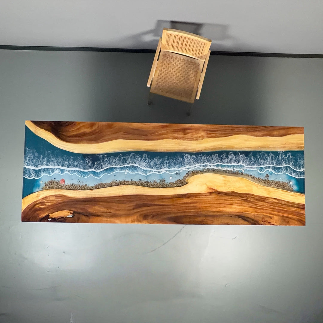 Artistic wood and resin dining table with coastal shoreline effect