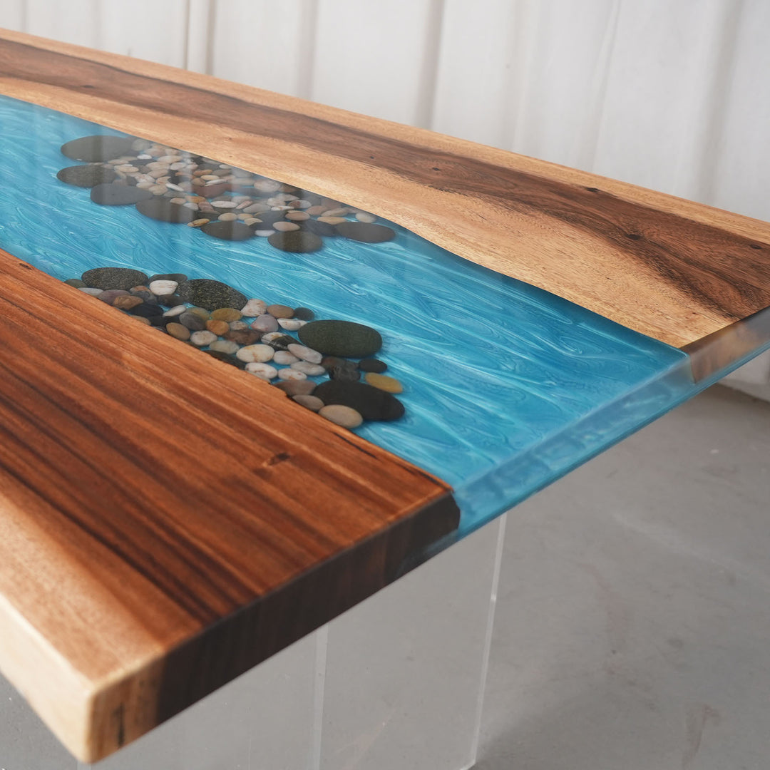 Luxury walnut river resin table with embedded pebbles ready to ship