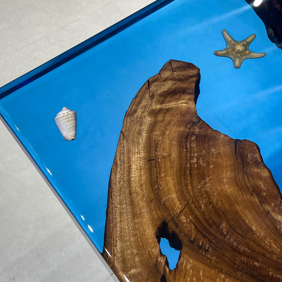 Luxury ocean-themed epoxy table with beach-inspired details