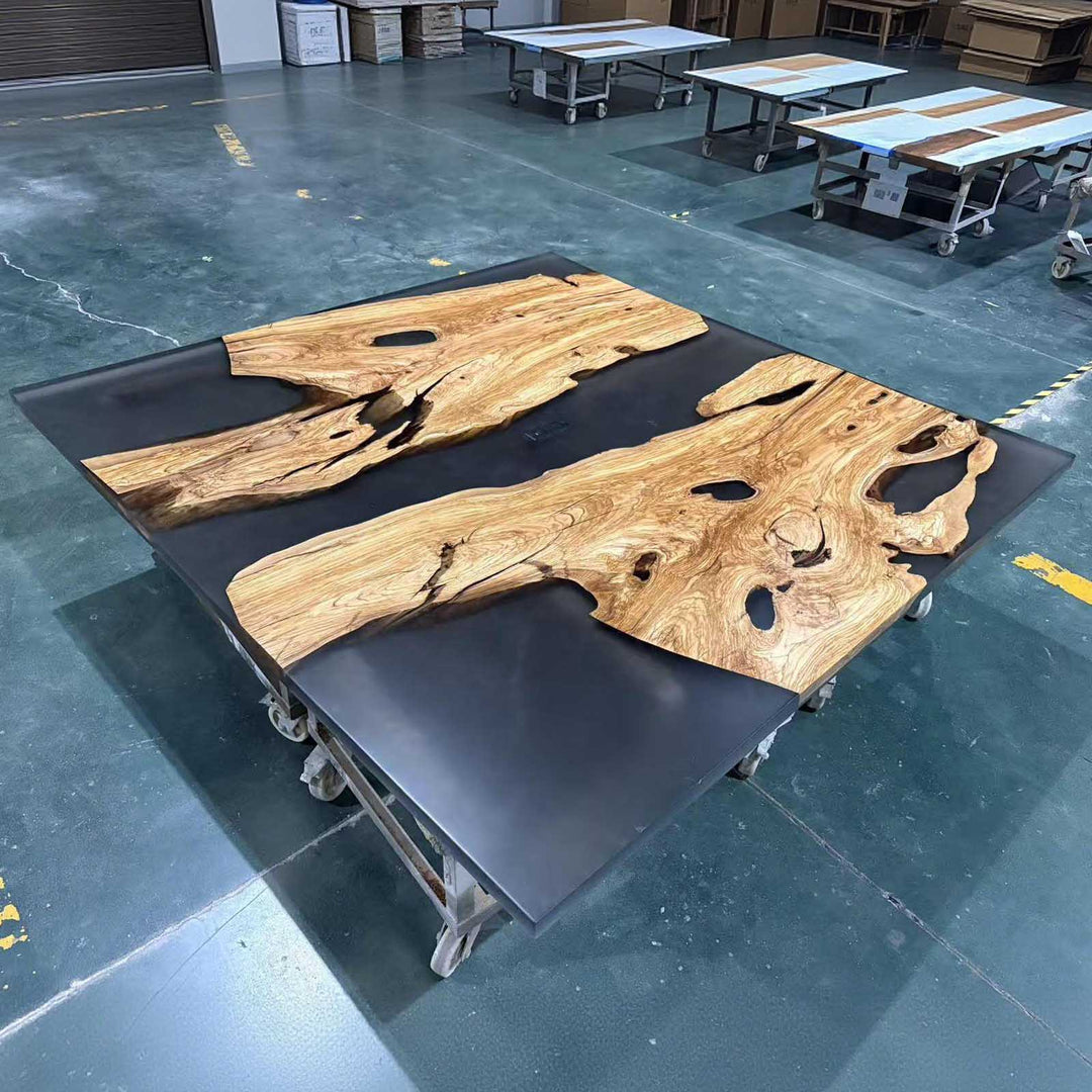 Rectangular black epoxy dining table with natural wood grain