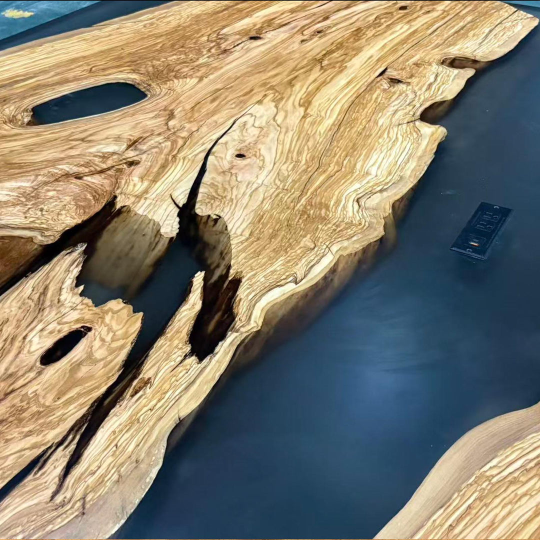 Solid wood and black resin statement dining table