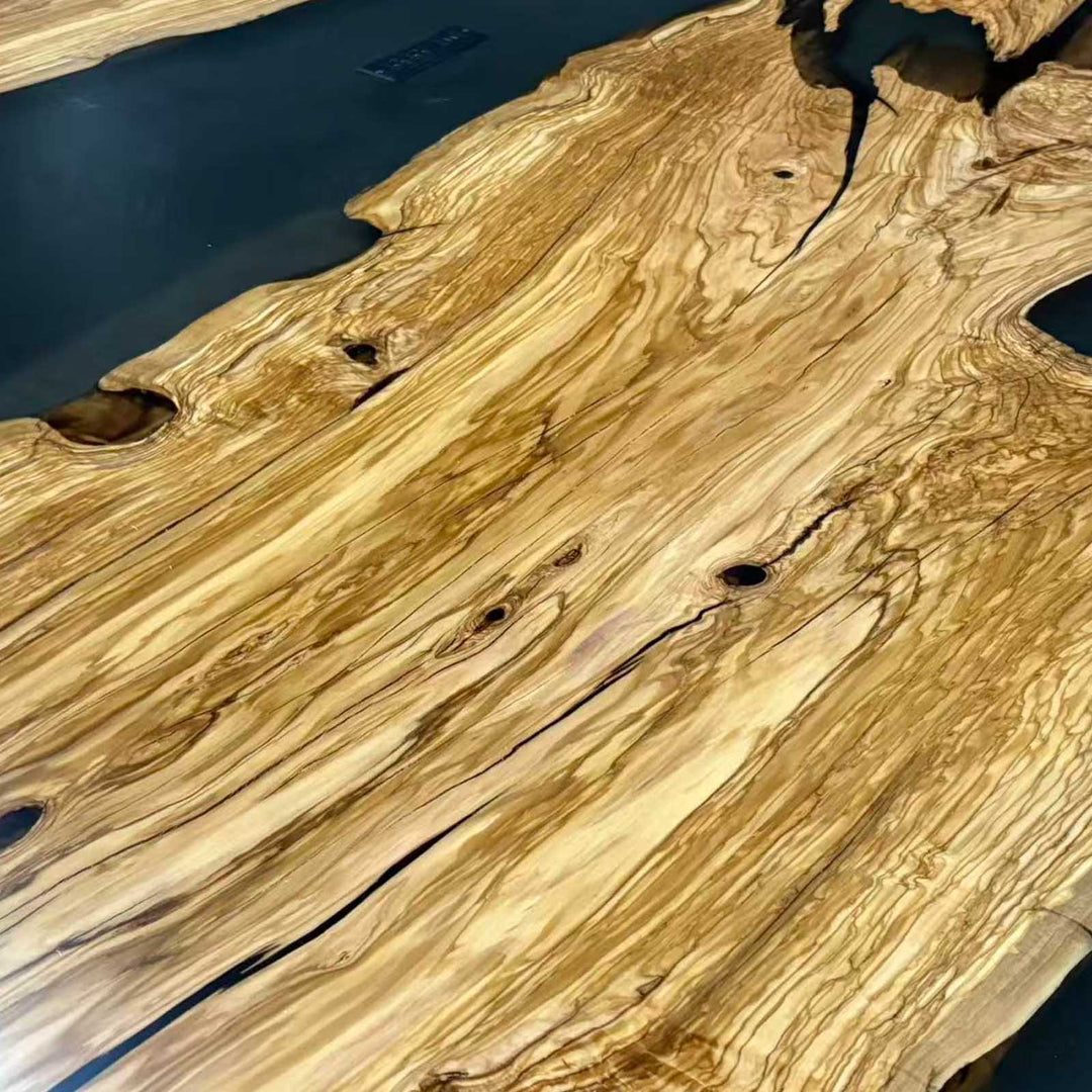 Luxury black resin dining table with natural void details