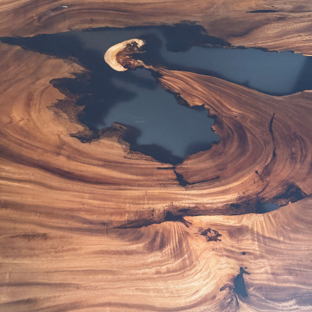 Luxury Live Edge Walnut Slab Table with artistic resin voids.