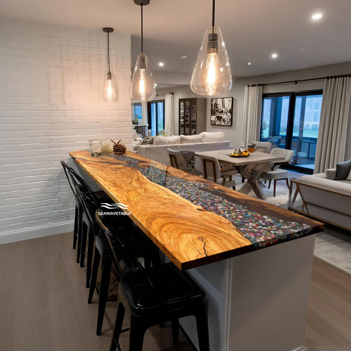 Straight edge olive wood river table with embedded colorful gaming dice in clear epoxy