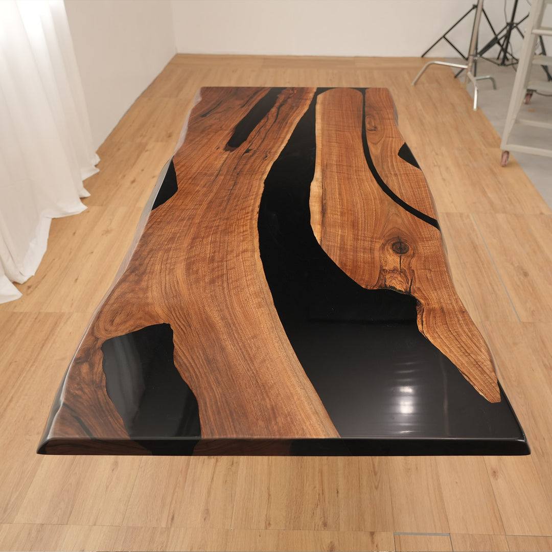 Bar top countertop made from live edge wood and black epoxy resin