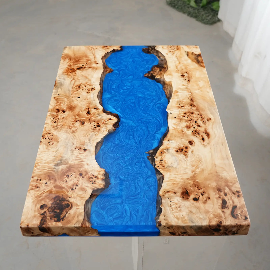 Modern coastal poplar wood dining table with vibrant blue resin center