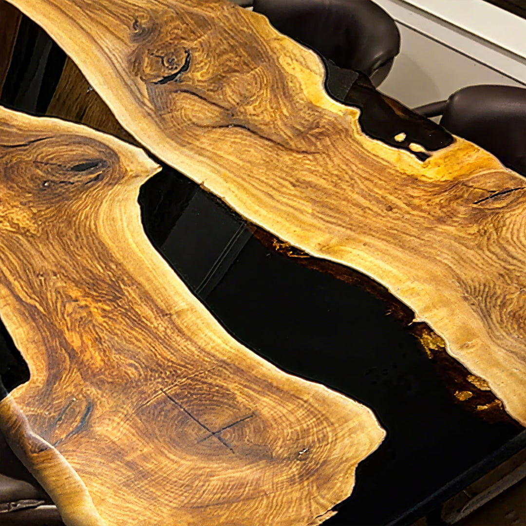 Modern luxury epoxy dining table with live edge and black resin