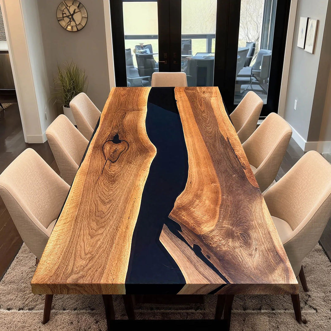 Luxury walnut epoxy resin river dining table with black resin center.