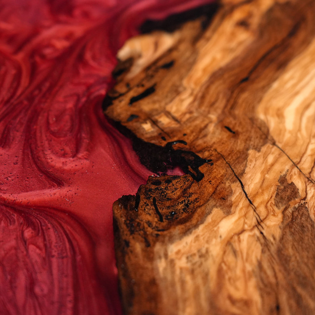 Unique handcrafted epoxy resin furniture piece with artistic red river effect