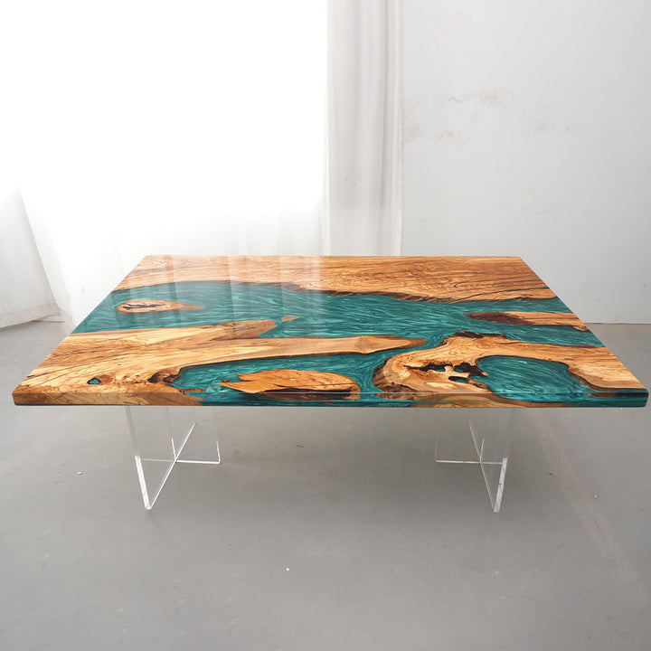 One-of-a-kind ocean-inspired epoxy resin art table with solid wood base.