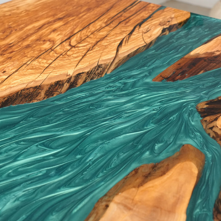 Custom epoxy resin dining table for high-end Malibu interior design projects.