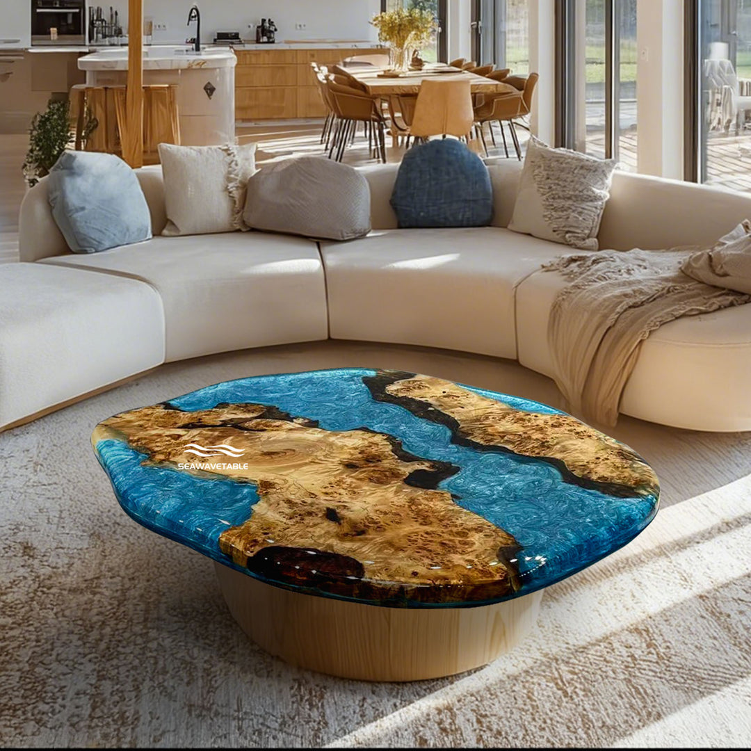 Blue epoxy river coffee table with natural poplar wood islands and ocean-wave resin patterns.