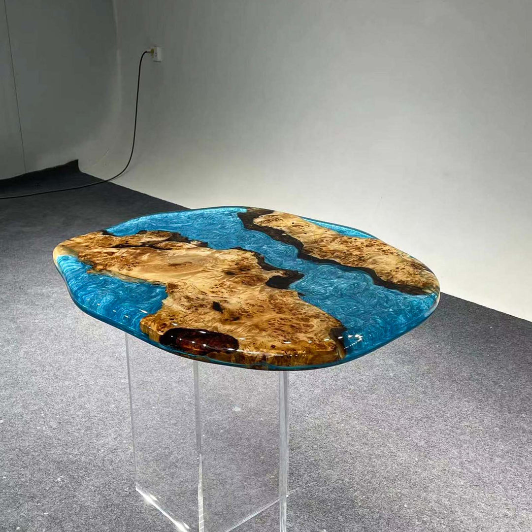 Handcrafted epoxy resin table with natural poplar wood grain and coastal-blue river design.