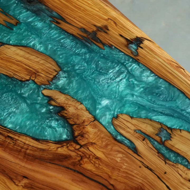 Luxury Miami coastal style dining table with blue resin and natural wood
