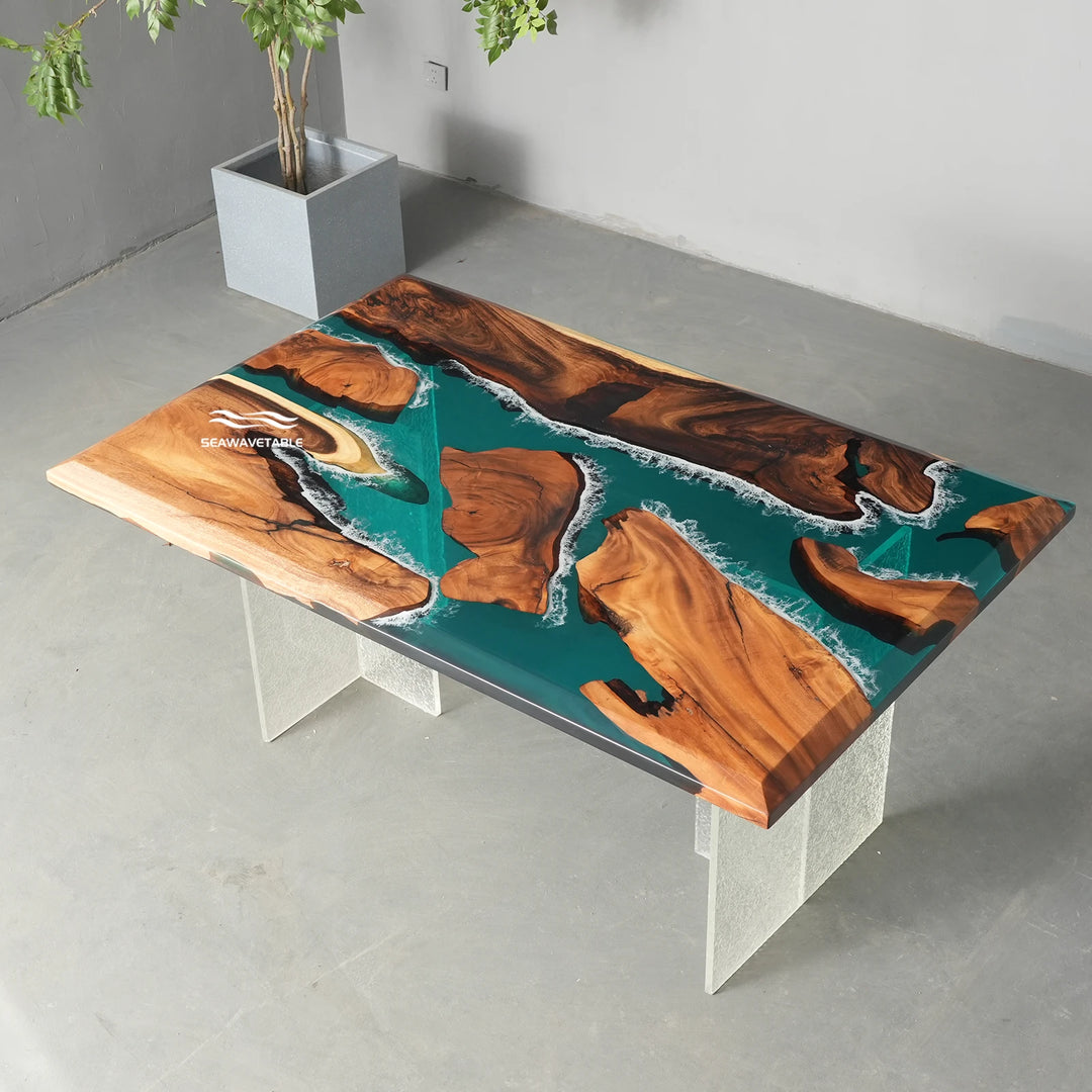 Custom wood and teal epoxy resin dining table inspired by tropical ocean waves