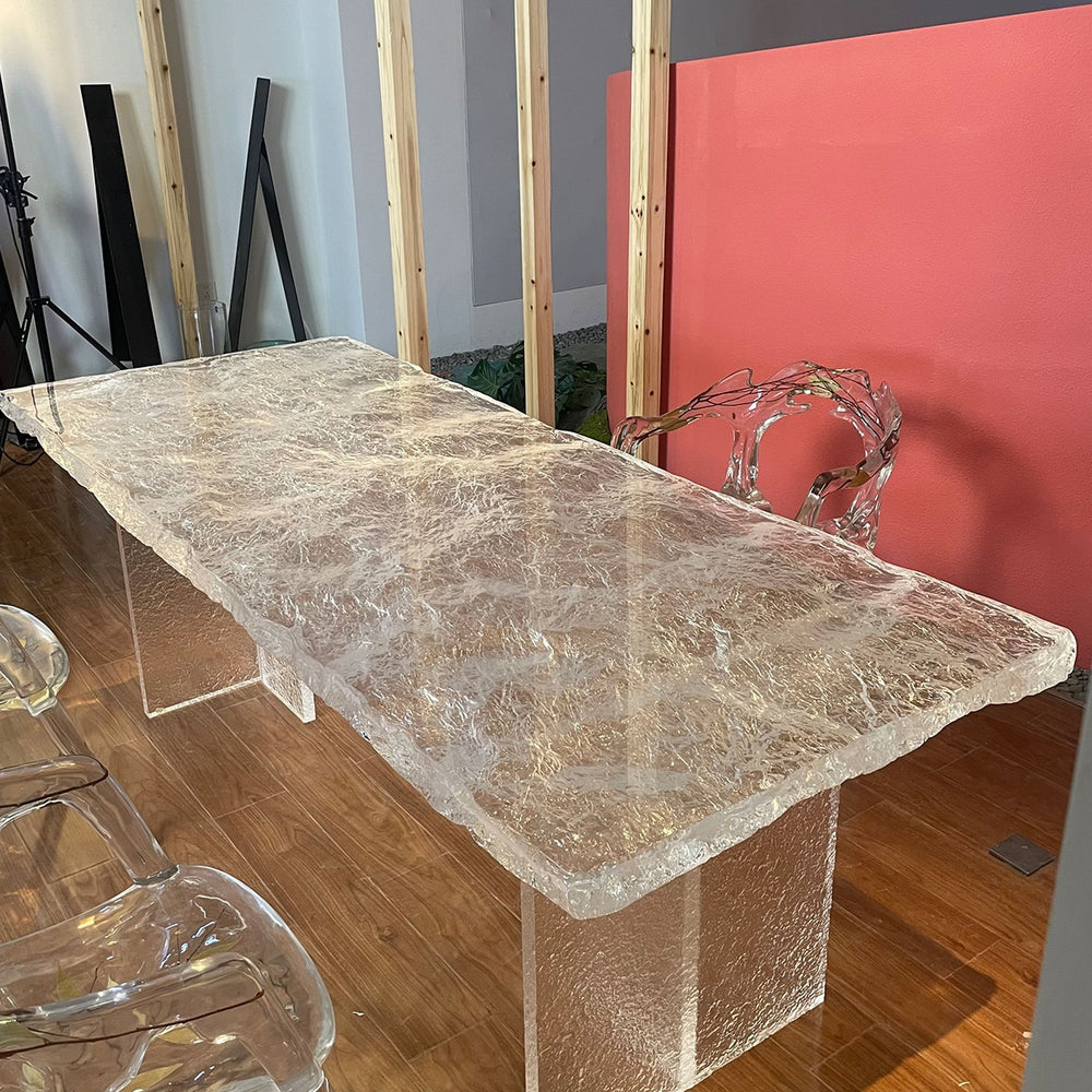 A unique resin dining table crafted from pure resin, featuring a textured surface.
