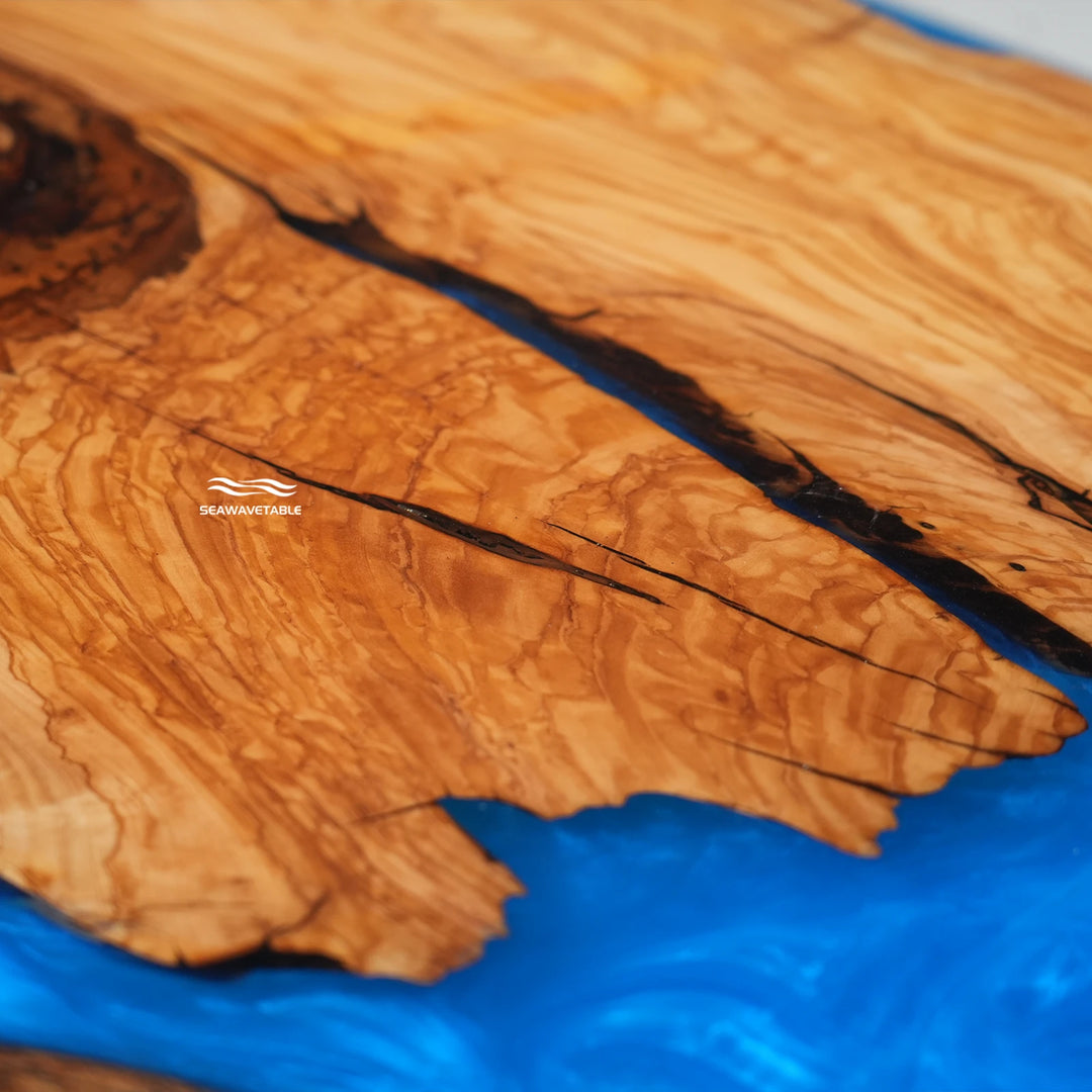 High gloss blue river resin dining table with natural olive wood grain