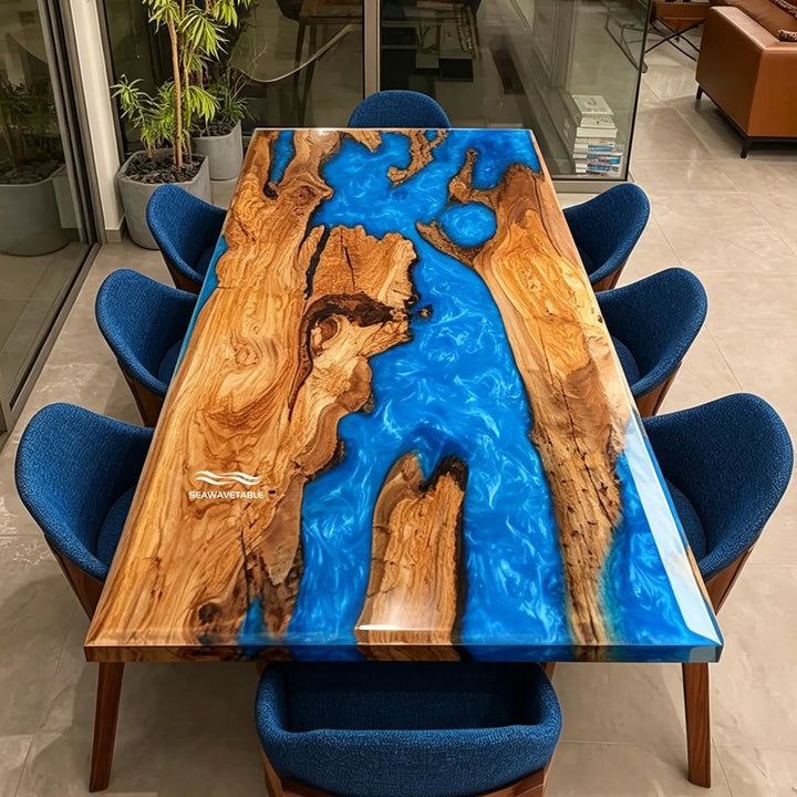 Swirling ocean blue resin river table in modern coastal dining room