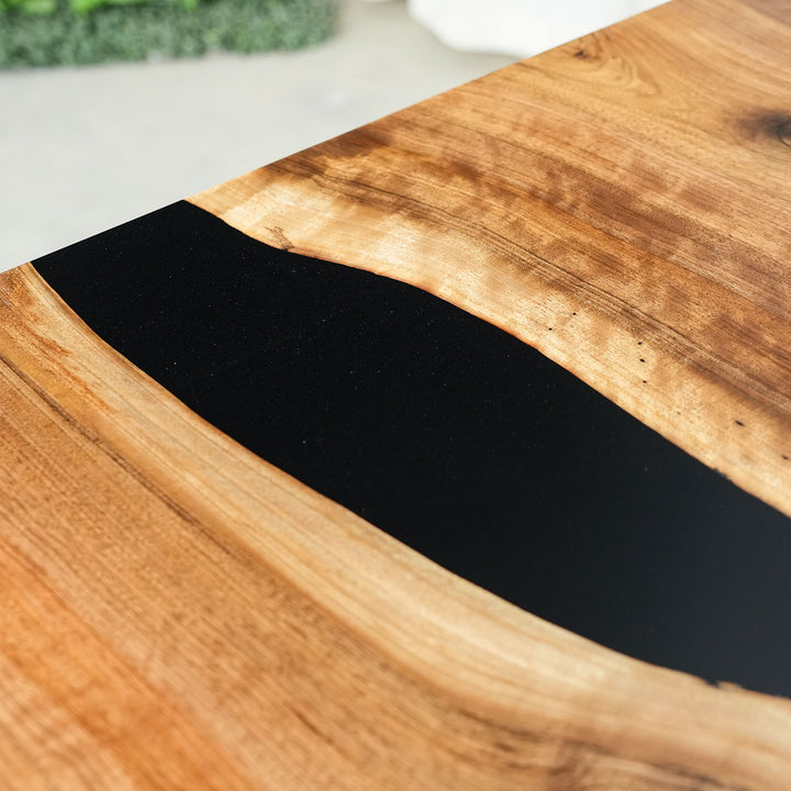 Luxury solid walnut slab table with dramatic epoxy river design