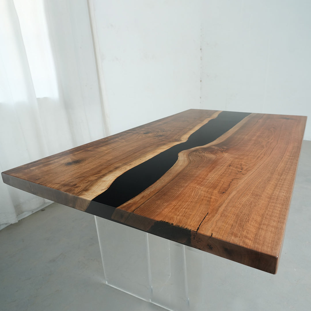 Custom black walnut epoxy river table for modern farmhouse interiors
