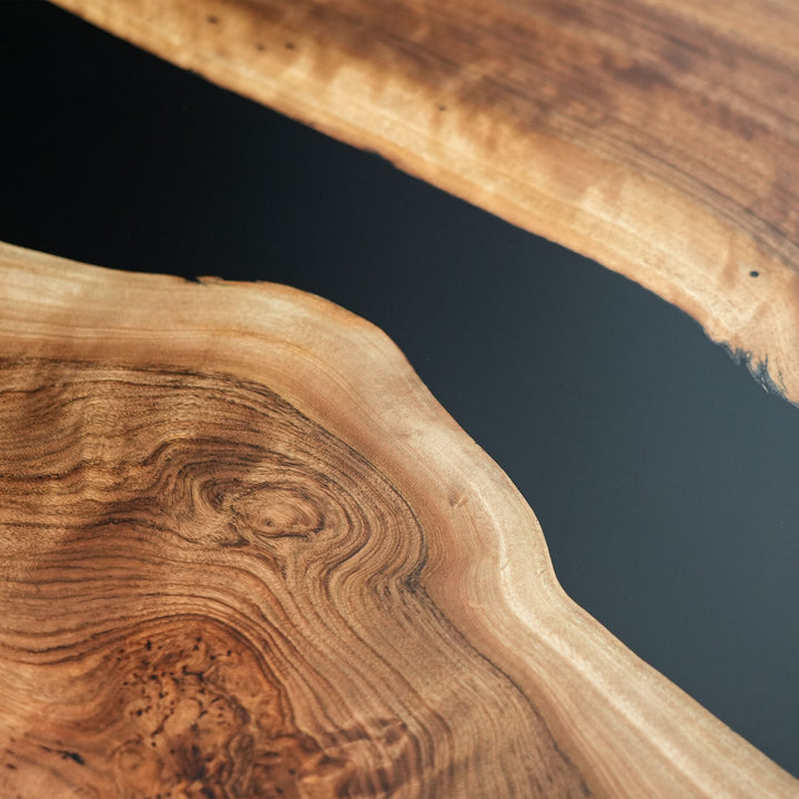 Artisan handcrafted walnut dining table with deep resin river