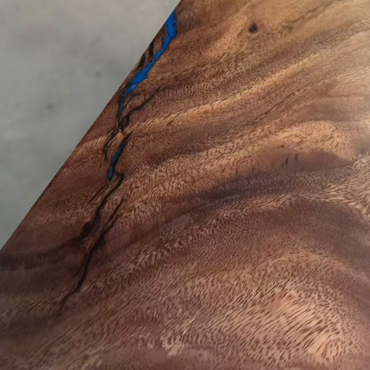 Sculptural walnut slab table designed for modern architectural spaces in New York