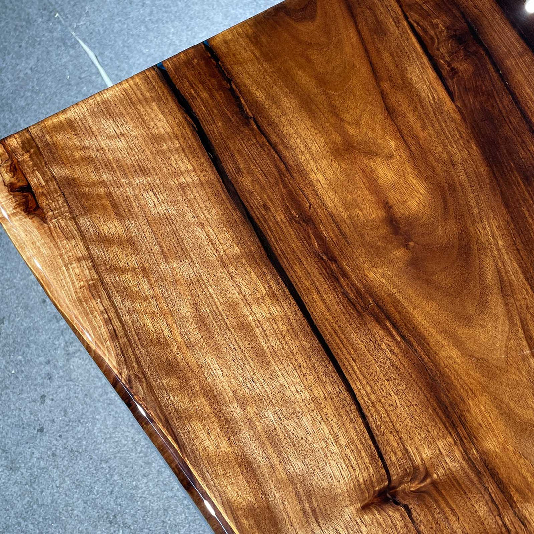Premium walnut dining table with artistic swirling epoxy resin