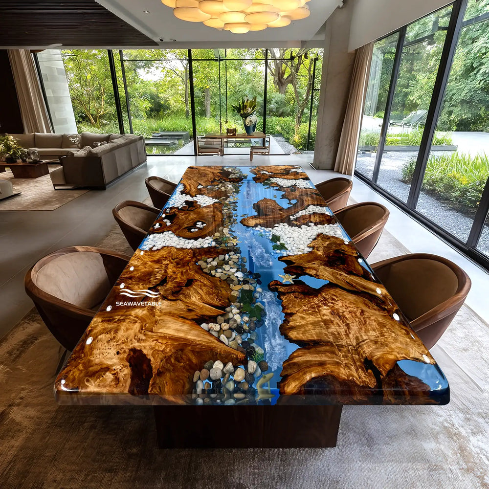 Coastal resin wood table with blue epoxy river and natural pebble details