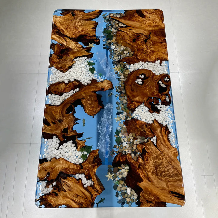 Luxury epoxy river table with driftwood grain and beach style elements