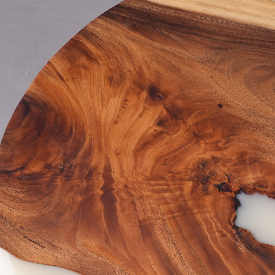Epoxy coffee table showcasing natural wood grain and resin contrast