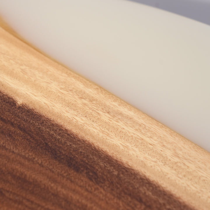 Top view of round walnut epoxy coffee table with Lunar Silk tone